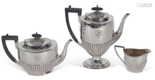 George V three-piece tea and coffee service of half-fluted t...