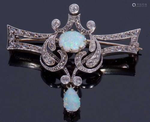Opal and diamond set brooch centring a cabochon opal within ...