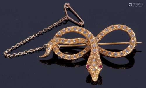 Vintage serpent brooch, the head features two red ruby eyes ...