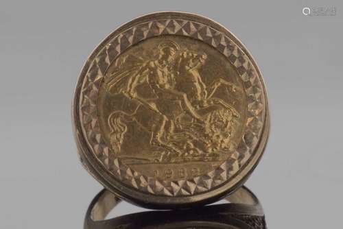 Elizabeth II half sovereign dated 1982, in a 9ct gold ring m...