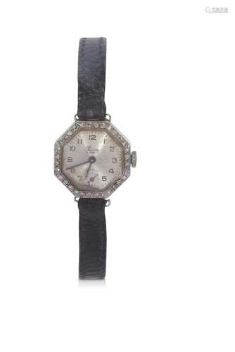 Ladies wrist watch featuring a white metal dial with contras...