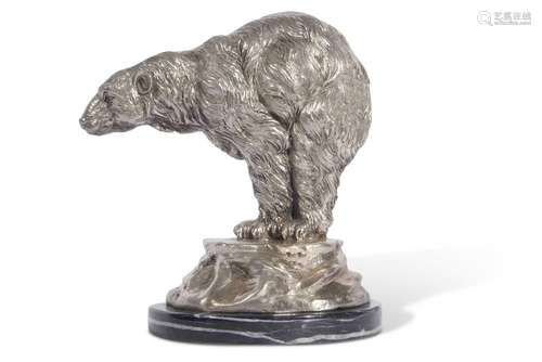 20th Century cast metal model of a Polar Bear set on a polis...