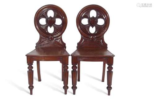 Pair Victorian mahogany hall chairs with circular pierced ba...