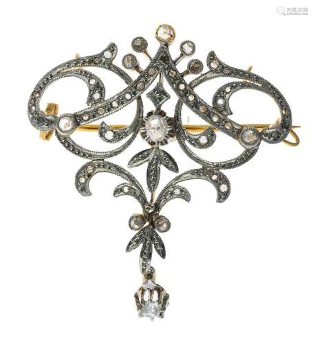 Broche “fleuron” en or sertie de diamants. Poids brut : 8,3 ...