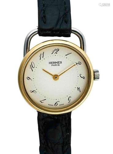 HERMES Paris. Montre “Arceau” en acier e or. Boitier rond. C...