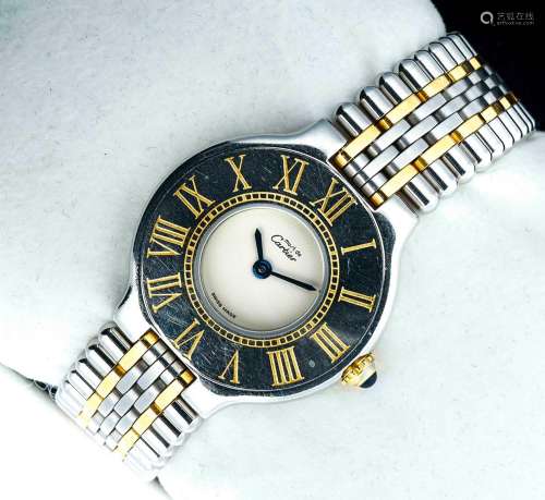 CARTIERMontre bracelet de dame “Must 21” en acier bicolore. ...