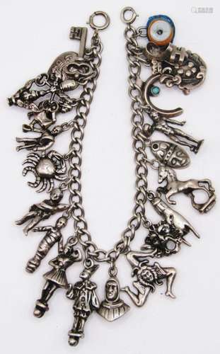 VINTAGE STERLING CHARM BRACELET LOADED WITH