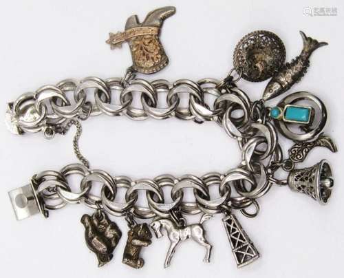 VINTAGE STERLING CHARM BRACELET LOADED WITH