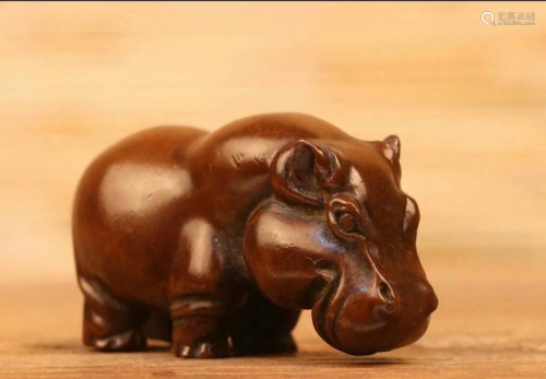 A cute Japanese bronze hippo sculpture