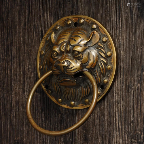 Pair of bronze lion doorbells