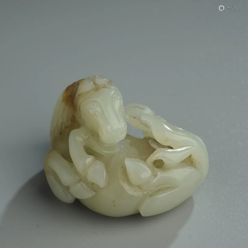 A white jade horse sculpture