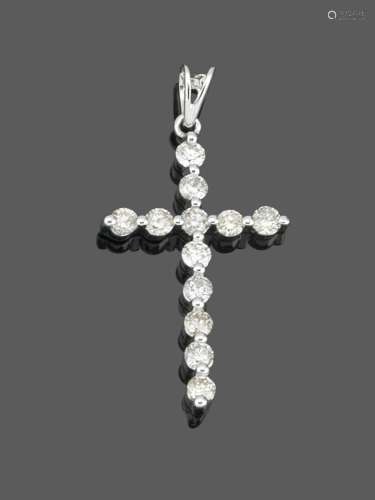 Fine croix en pendentifEn or blanc 18k (750) serti de 12 dia...