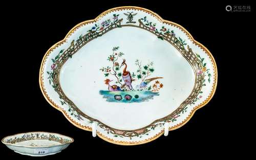 An Antique Chinese Lobed Dish, with central stylised peacock...