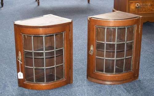 Two Oak Corner Cabinets, with leaded glass fronts and two in...