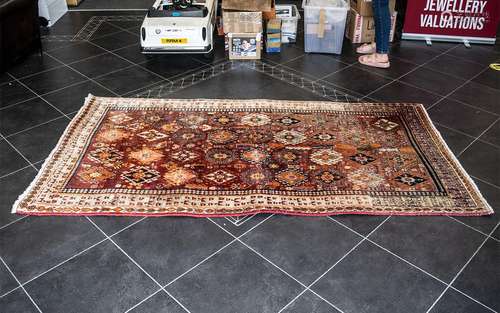 Wool Rug, geometric design, mainly beige and rust/orange col...