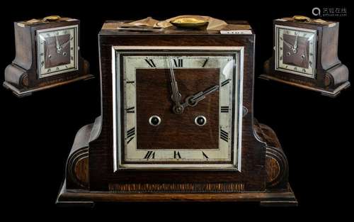 An Oak Cased Art Deco Mantle Clock with square chapter dial ...