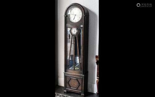 An Art Deco Long Cased Clock with silver dial, with Arabic n...