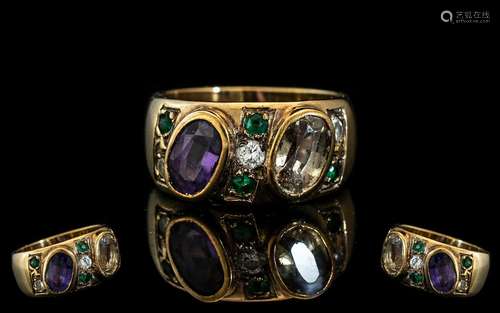 A Sapphire Peridot Diamond and Emerald Set Bombe Style Ring,...