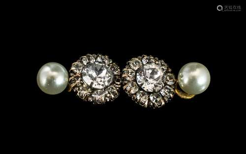 A Pair of 9ct Gold Antique Earrings set with clear paste. Di...