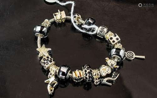 Pandora Style Charm Bracelet, in a Pandora box, filled with ...