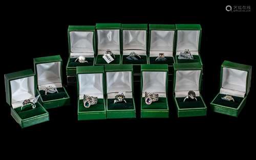 Collection of Twelve Silver Dress Rings, set with coloured c...