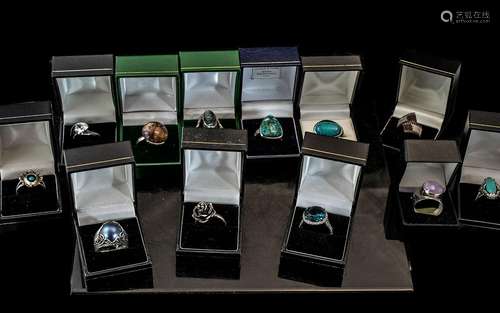 Collection of Twelve Silver Dress Rings, set with coloured c...