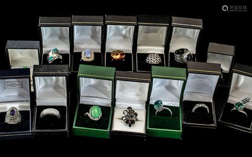 Collection of Thirteen Silver Dress Rings, set with coloured...