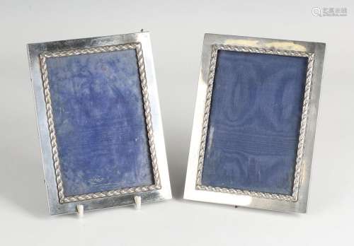 A pair of Edwardian silver rectangular photograph frames, ea...