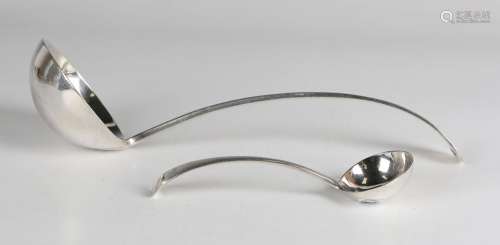 A George V silver Old English pattern soup ladle and matchin...