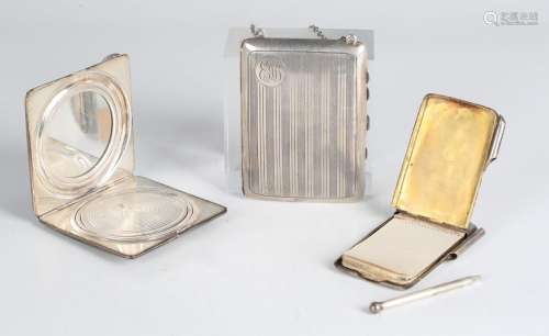 A sterling engine turned rectangular combination purse, the ...