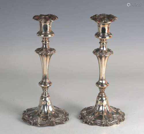 A pair of William IV silver candlesticks, each with a detach...