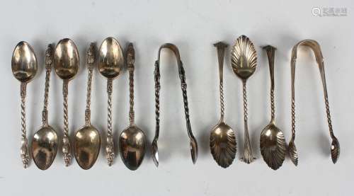 A set of six late Victorian silver apostle teaspoons and a p...