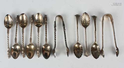 A set of six late Victorian silver apostle teaspoons and a p...