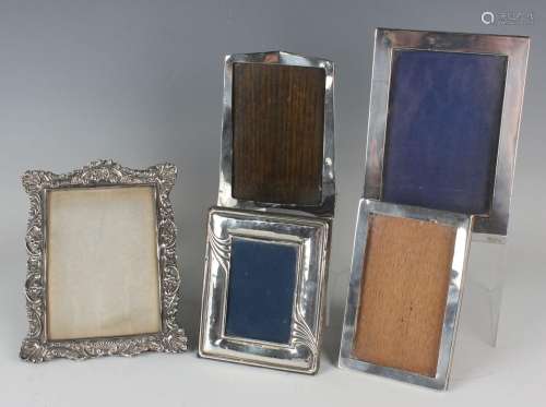 A late Victorian silver mounted shaped rectangular photograp...