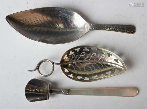 A George III silver caddy spoon, the leaf shaped bowl with e...