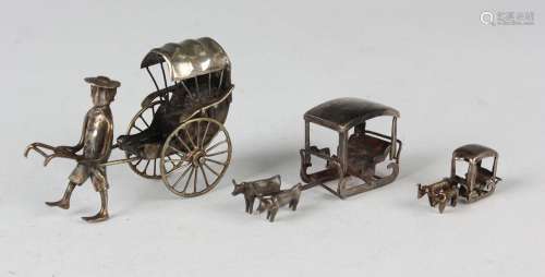 A Chinese silver model of a rickshaw, length 6.5cm, a French...