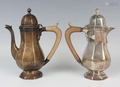A pair of George V silver café-au-lait pots, each of octagon...
