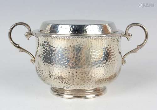 A George V silver circular porringer and cover with overall ...