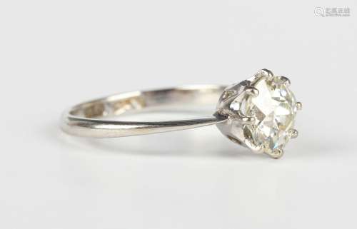 An 18ct white gold, platinum and diamond solitaire ring, cla...