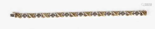 A two colour gold bracelet in an curved bar and twist link d...