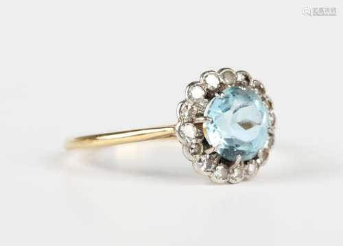 A gold, platinum, aquamarine and diamond cluster ring, claw ...