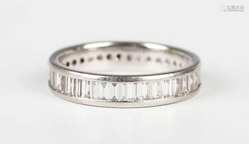 A platinum and diamond full eternity ring, channel set with ...