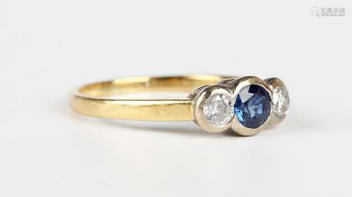 An 18ct gold, sapphire and diamond three stone ring, collet ...