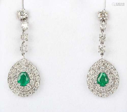 A pair of 18ct white gold, emerald and diamond pendant earri...