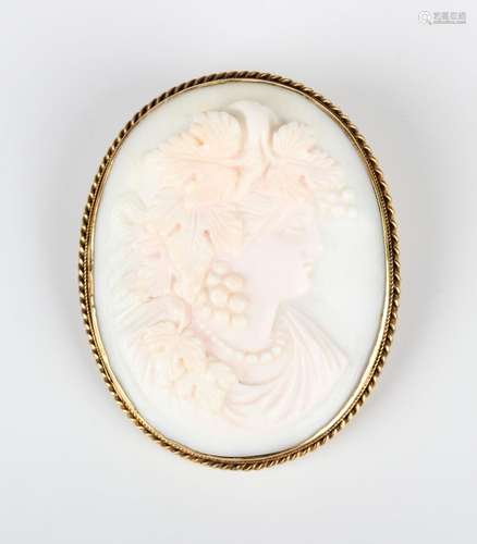 A gold mounted oval pink shell cameo brooch, circa 1900, car...