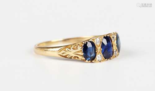 An Edwardian gold, sapphire and diamond ring, mounted with a...