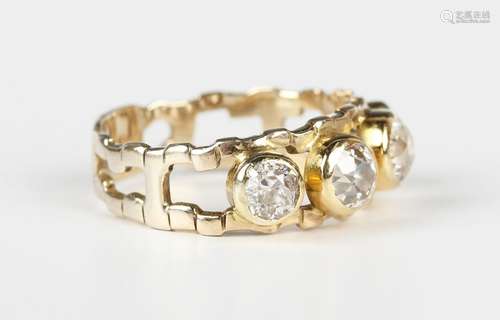 A 9ct gold and diamond ring, mounted with a row of four cush...