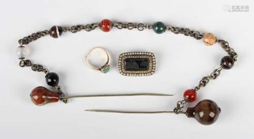 A Georgian gold and seed pearl mourning brooch, the centre w...