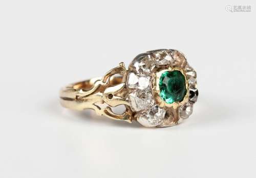 A gold and silver set, emerald and diamond cluster ring, mou...