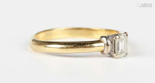 An 18ct gold and diamond single stone ring, claw set with th...